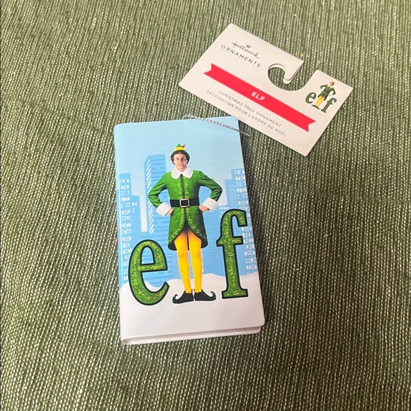 Hallmark Other - NEW Hallmark Buddy the Elf book Christmas tree ornament plastic
L